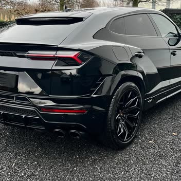 A black Lamborghini Urus photographed after detailing.