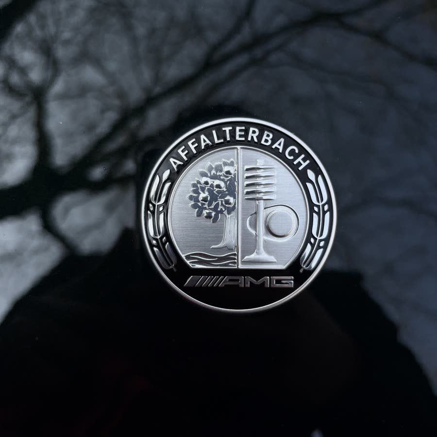 An Affalterbach AMG bonnet badge after polishing.