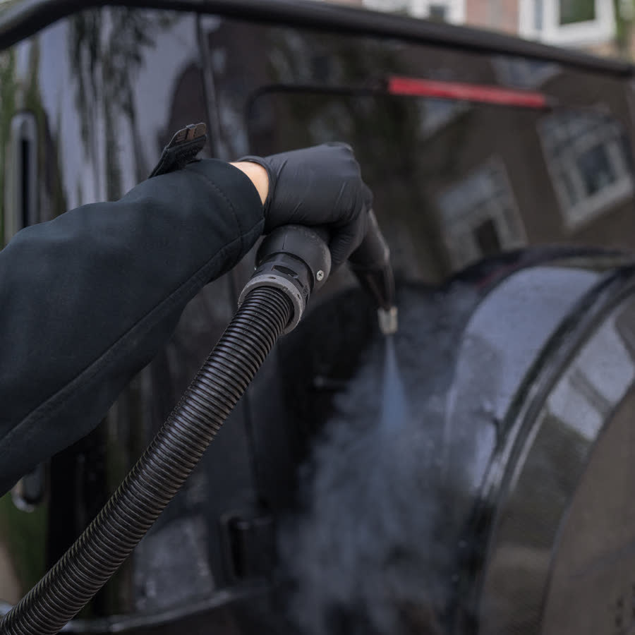 Steam cleaning a wheel on location.